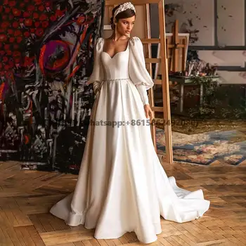 Красивые элегантные свадебные платья с открытыми плечами Новинка 2023 года Белый Великолепный атлас с длинным рукавом Сексуальный простой халат с открытой спиной Свадебное платье